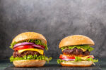 From Trend to Staple: Why Plant-Based Burgers Are Here for Good 7homemade delicious sandwiches black board gray blurred surface